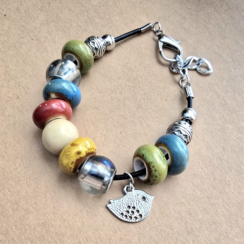 Colorful Beaded Bracelet with Silver Bird Charm